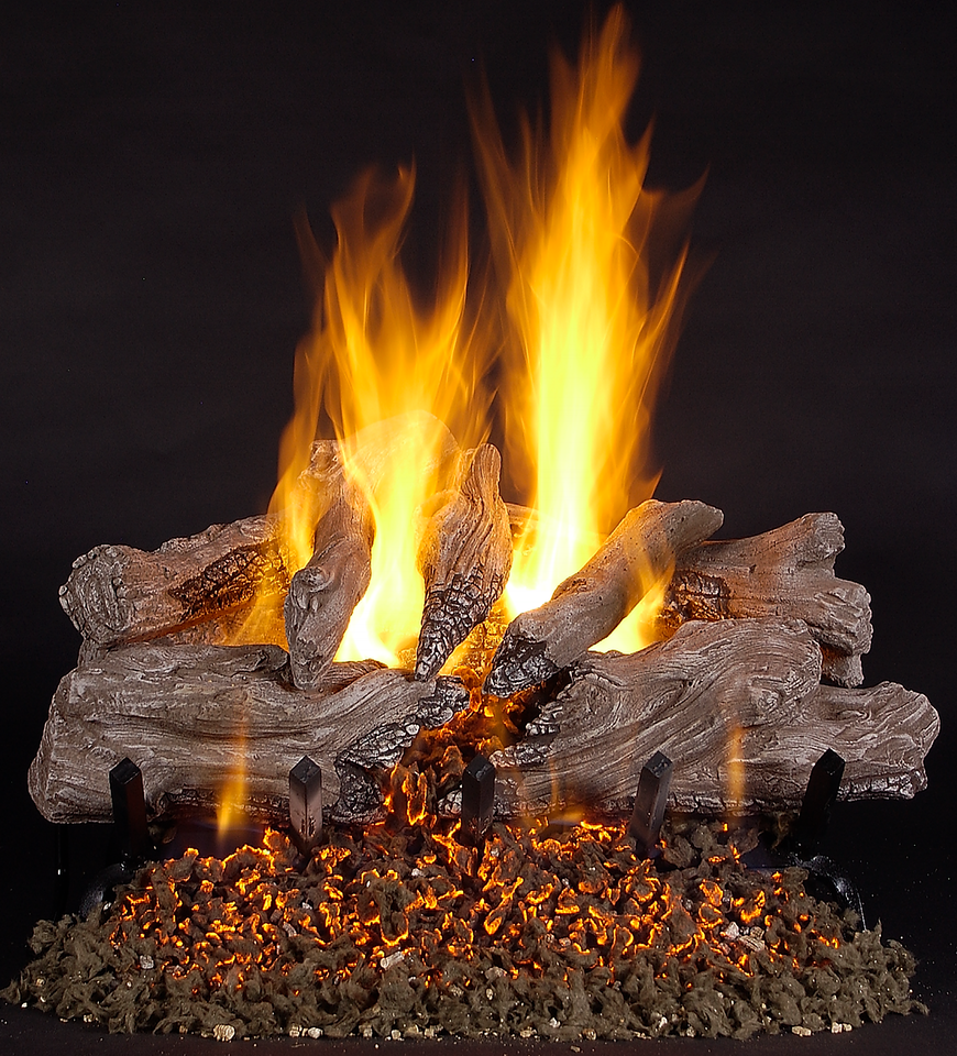 Photo of gas logs with beatiful yellow and orange flames.