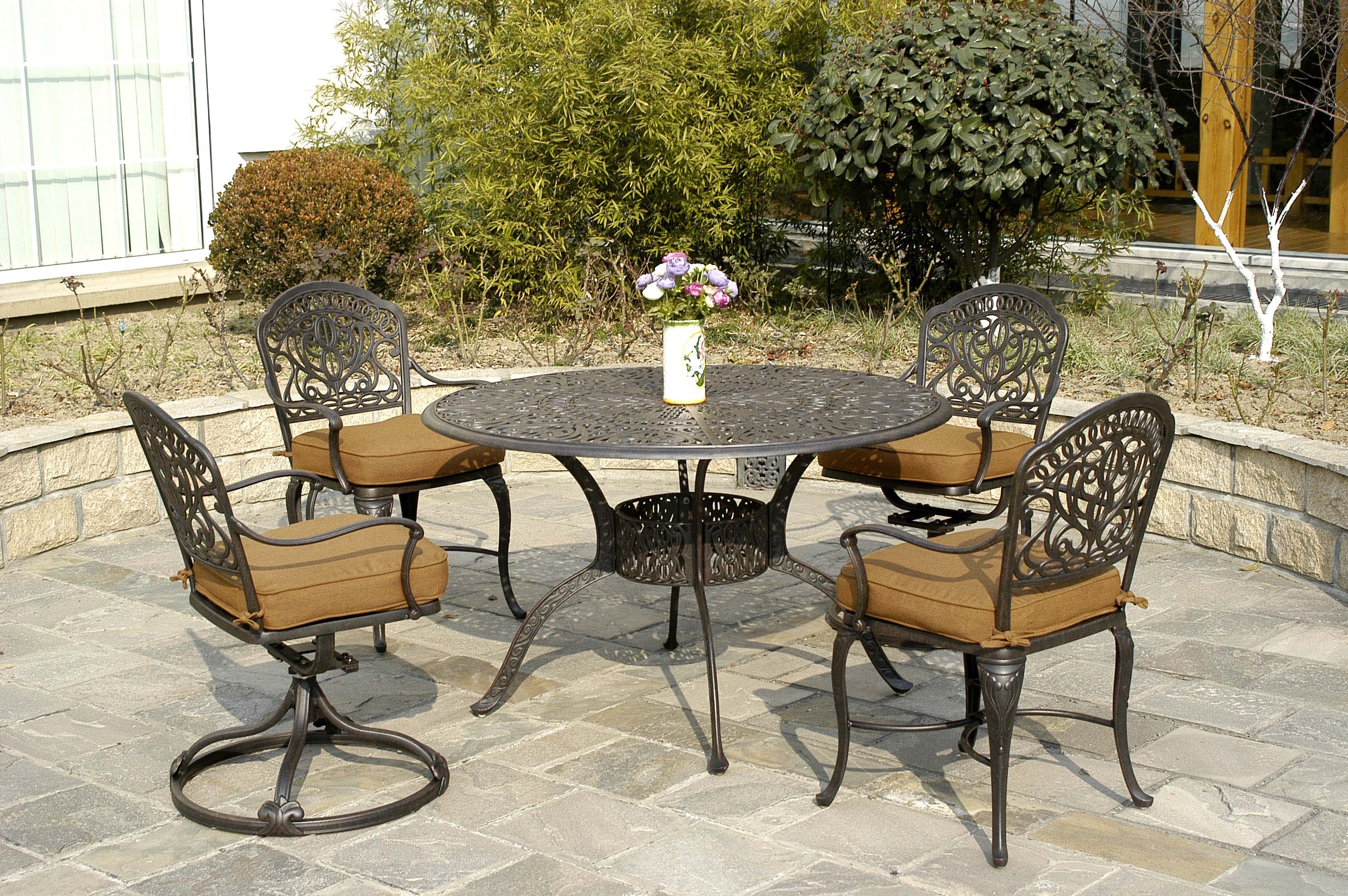 Photo of outdoor patio set - 4 chairs and round table.