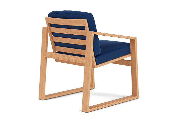 Pursuit Dining Armchair by Lloyd Flanders