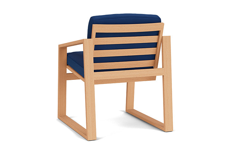 Pursuit Dining Armchair by Lloyd Flanders