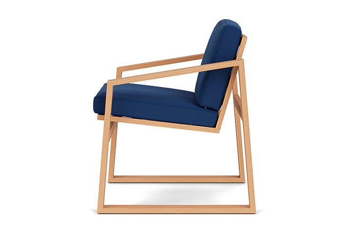 Pursuit Dining Armchair by Lloyd Flanders